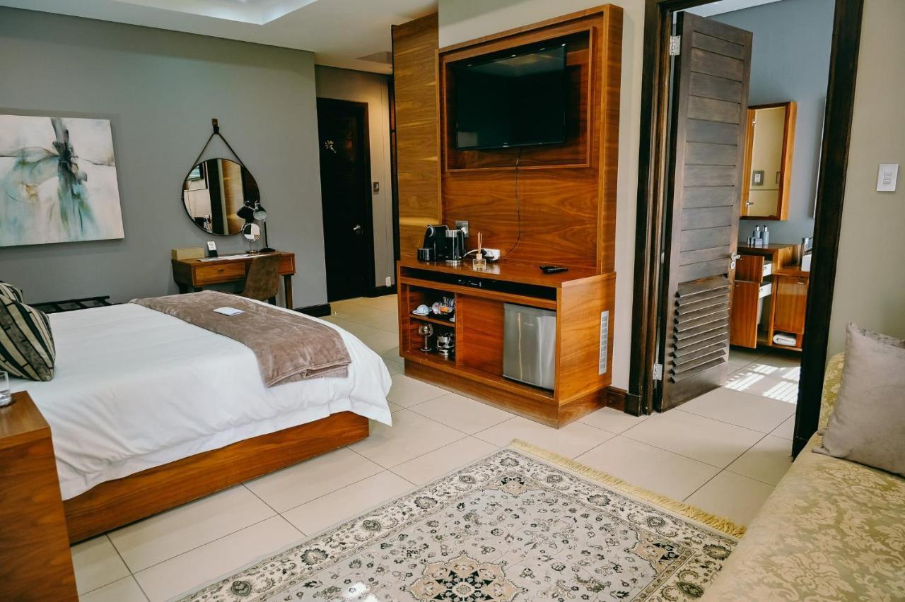 Tredenham Boutique Hotel Bloemfontein Exteriér fotografie A room at the hotel