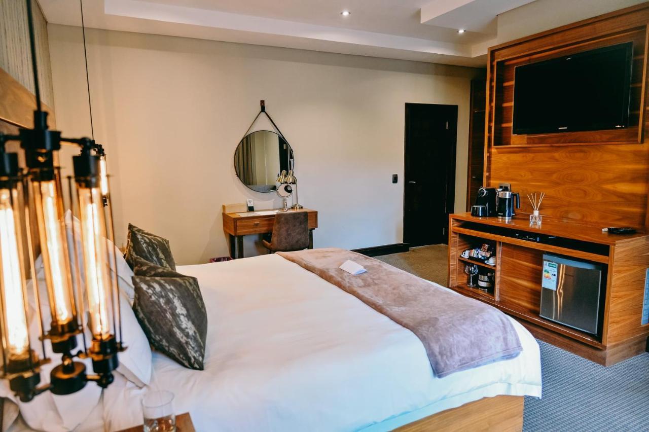 Tredenham Boutique Hotel Bloemfontein Exteriér fotografie A room at the hotel