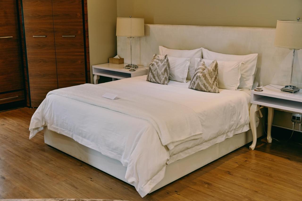 Tredenham Boutique Hotel Bloemfontein Exteriér fotografie A bed