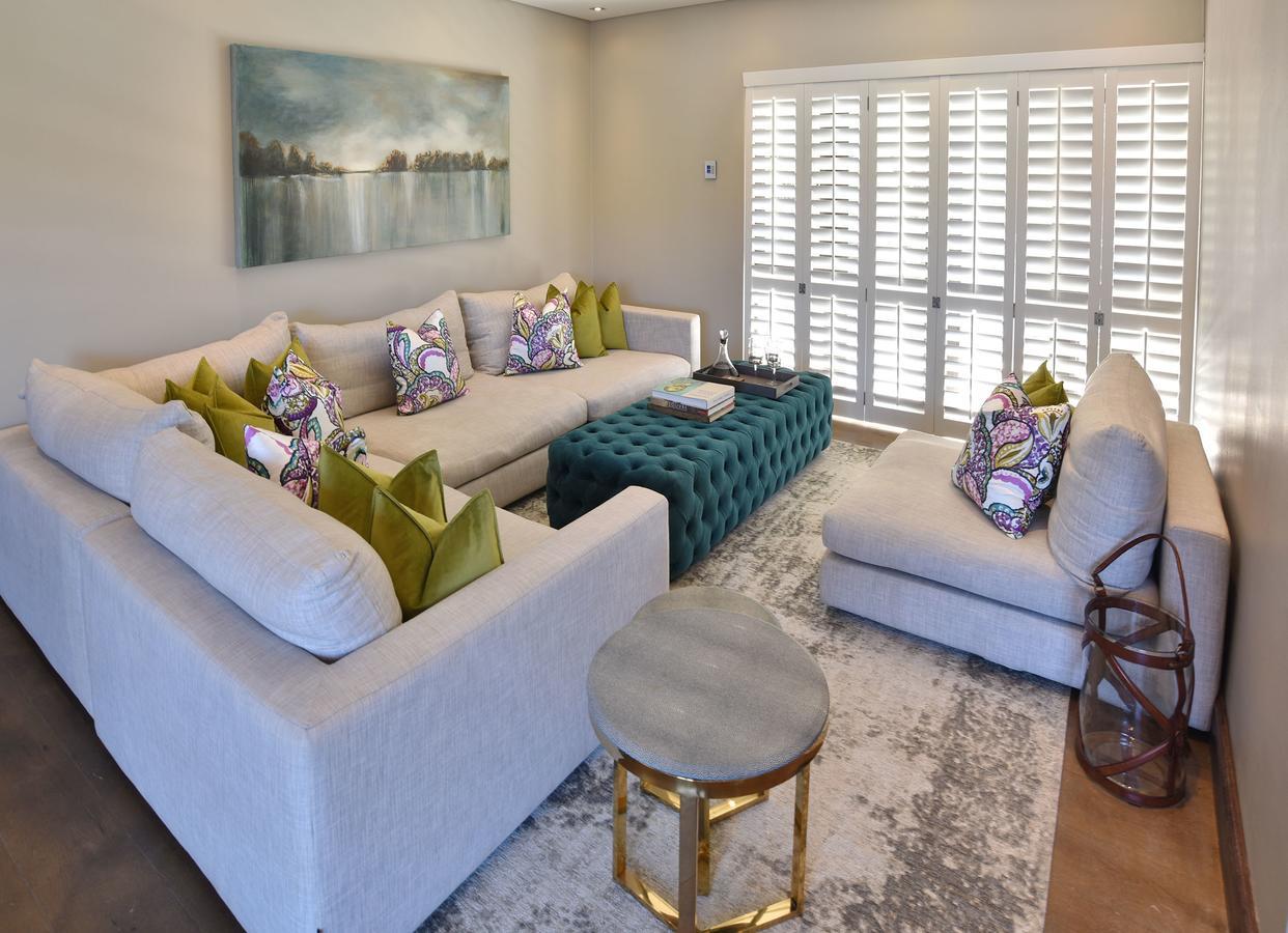Tredenham Boutique Hotel Bloemfontein Exteriér fotografie A living room with plantation shutters