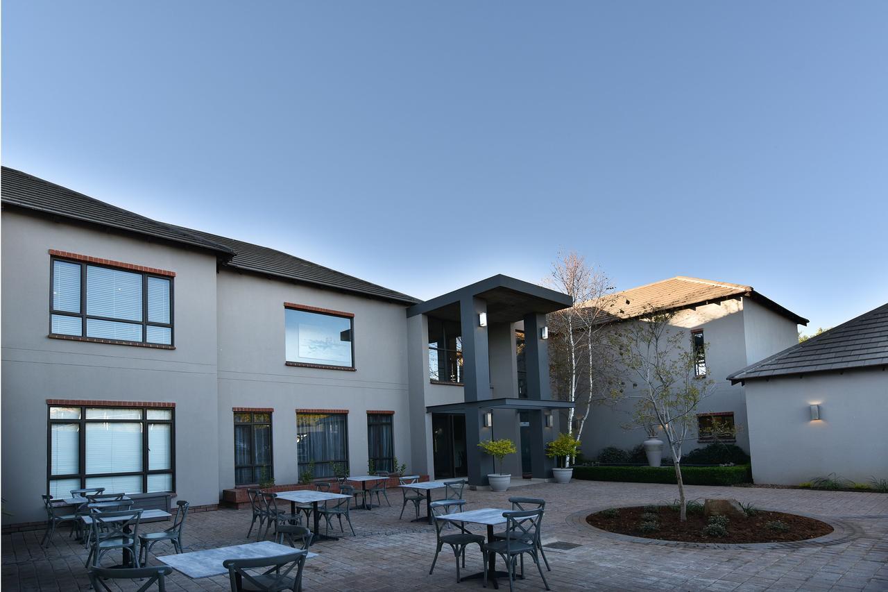 Tredenham Boutique Hotel Bloemfontein Exteriér fotografie The courtyard at the University of Pretoria Faculty of Law